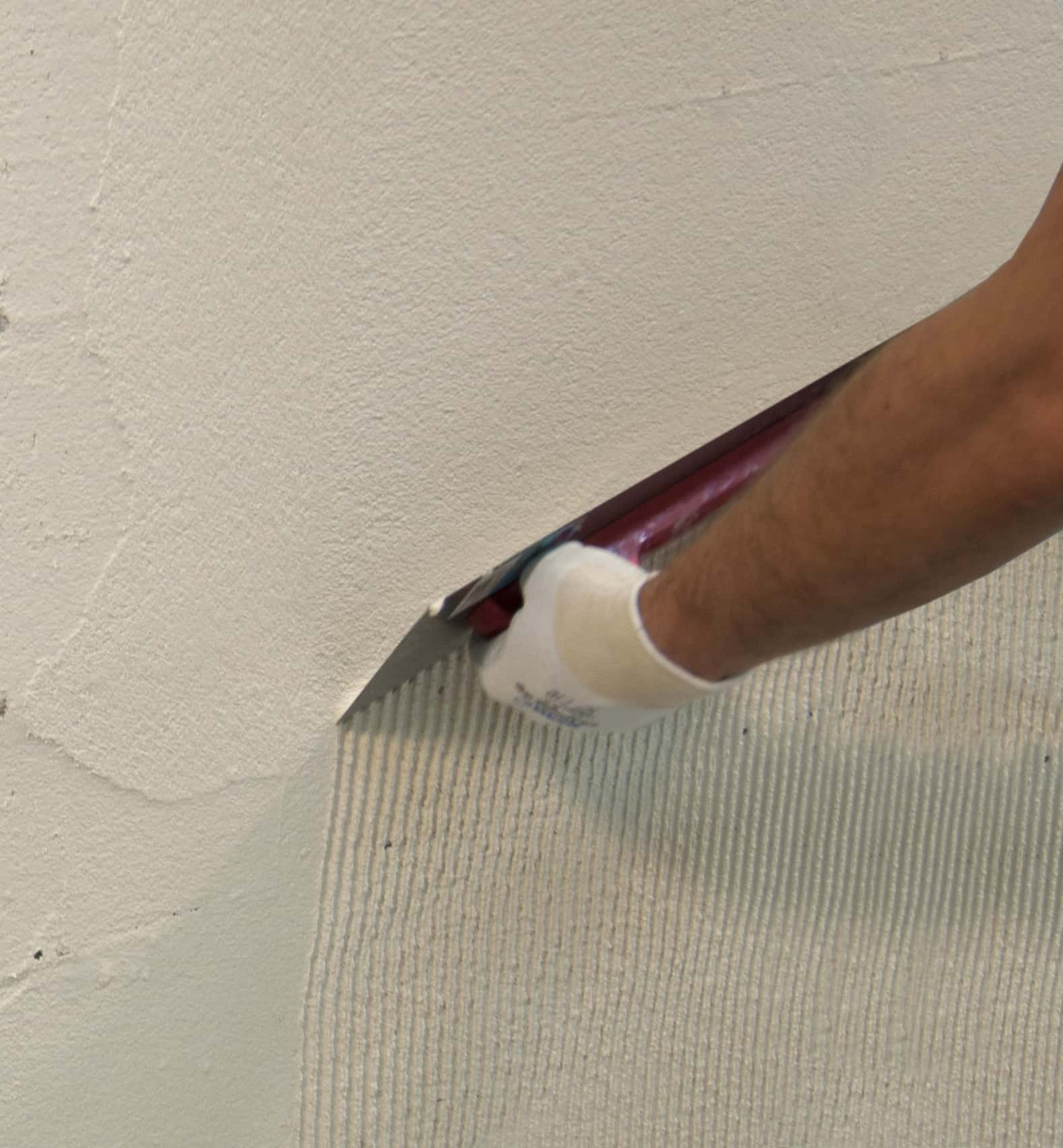Sfondo L'attrezzo per rasare i muri perfetto per il tuo lavoro